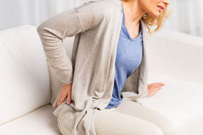woman suffering back pain